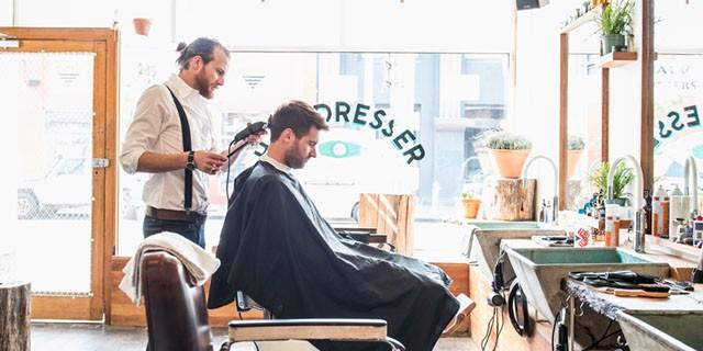 A barber giving a haircut 
