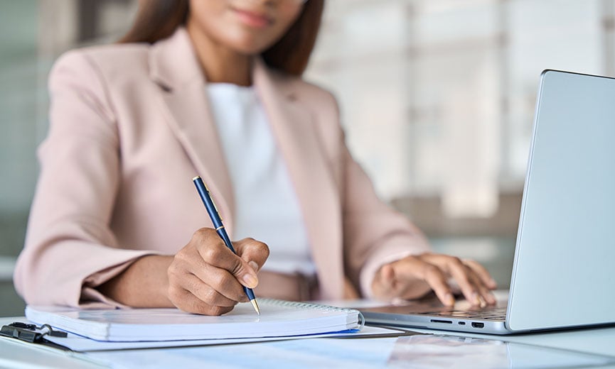 A tax professional prepares to file income tax returns for a business