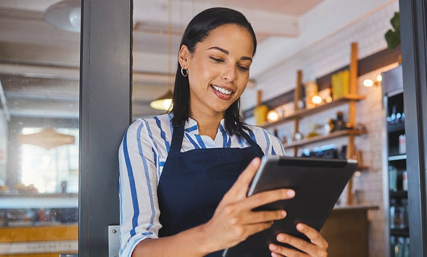 a business owner looks into buying workers' comp for her business