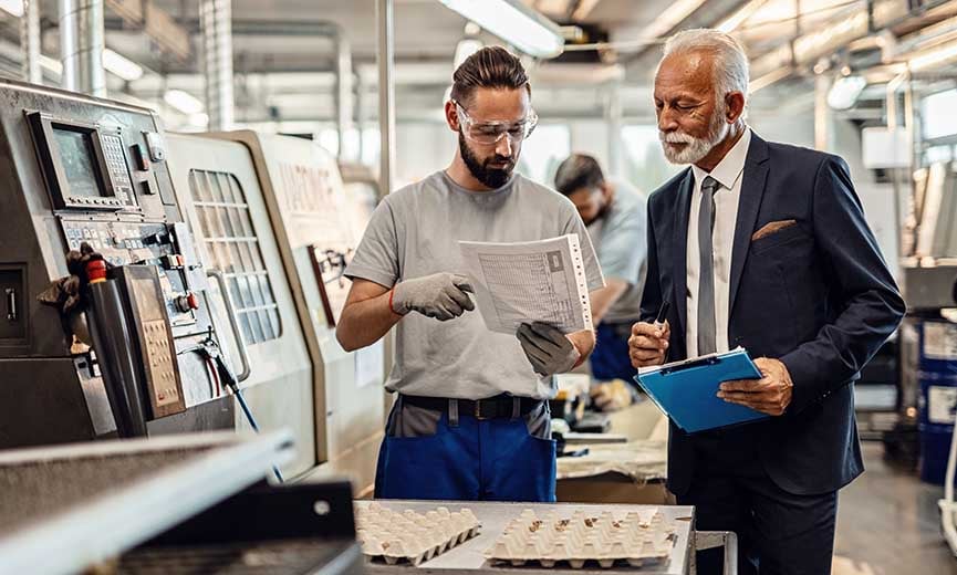 A manufacturing company owner negotiates better terms to improve cash flow