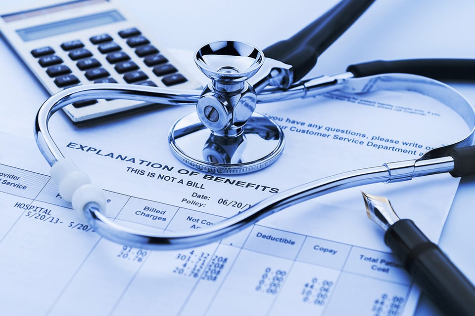 Insurance bill with calculator.
