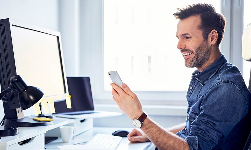 checking cell phone to read faqs