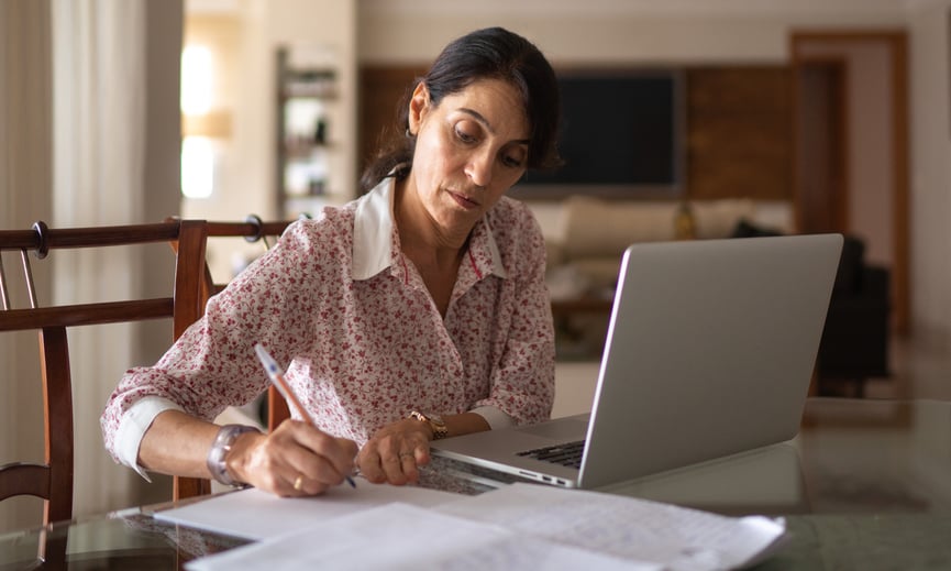 employee reviewing retirement plan amidst America's savings crisis