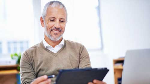 a business owner reviewing his payroll taxes