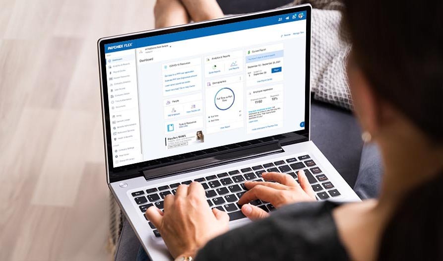 A business owner using Paychex Flex