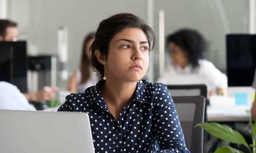 a dissatisfied employee thinking about leaving her employer