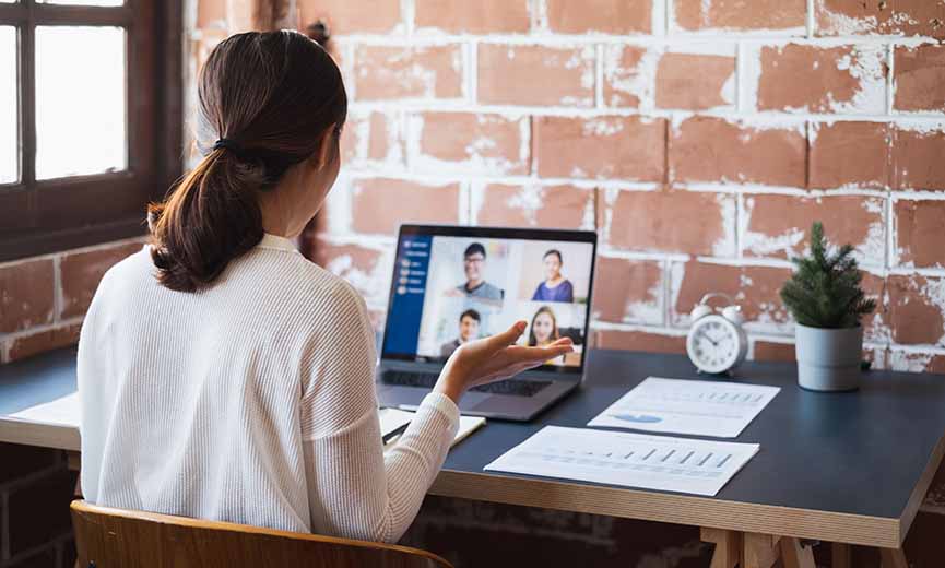a business owner managing her remote employees