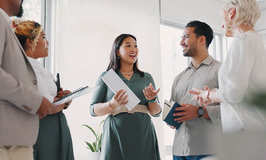 a manager discussing goal setting with her employees