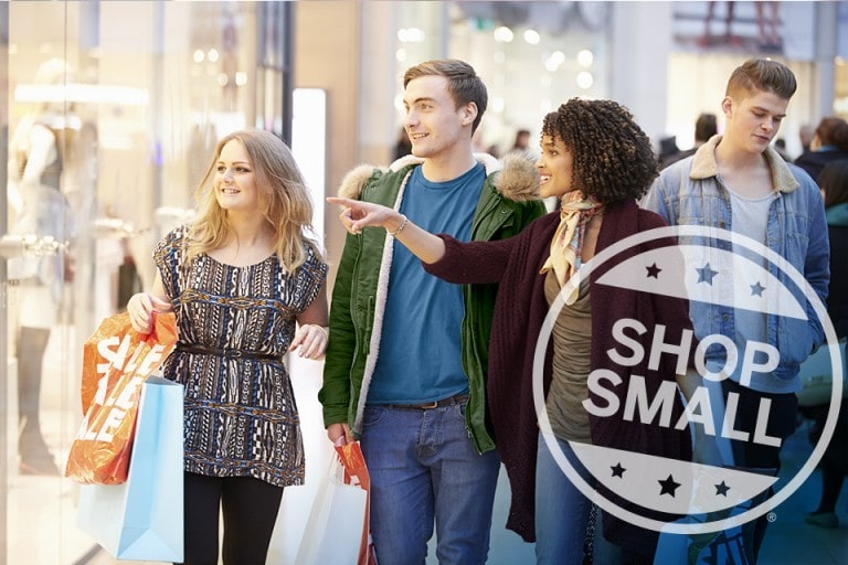 A group of people shopping on Small Business Saturday.