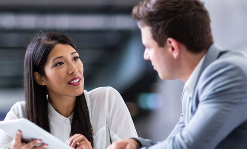 two coworkers discussing about prospecting