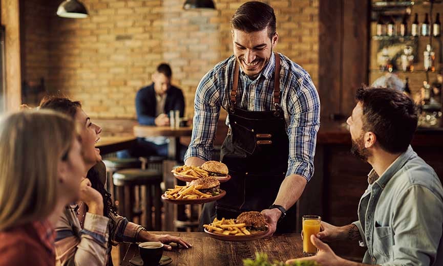A server at a restaurant who receives tips in recognition of good service