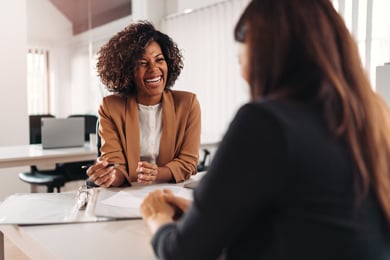 knowledge able insurance agent helping small business owner