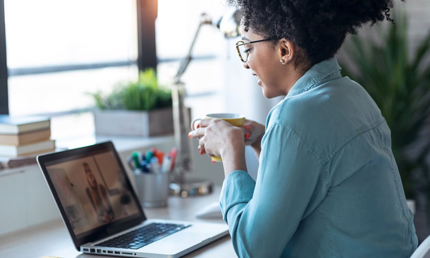 Small Business owner in a video call about outsourcing employee benefits