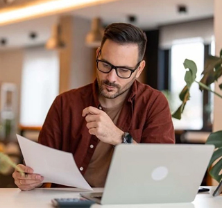Business owner creating a profit and loss statement