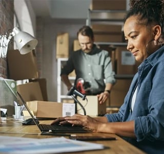 Business owner working on laptop