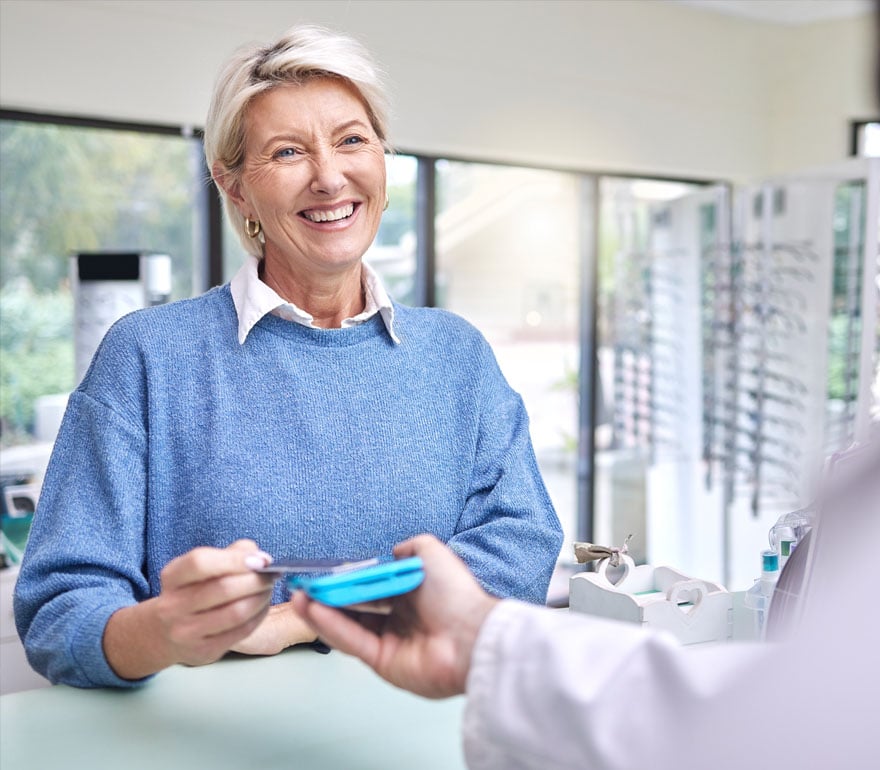 An employee paying for glasses using her HSA