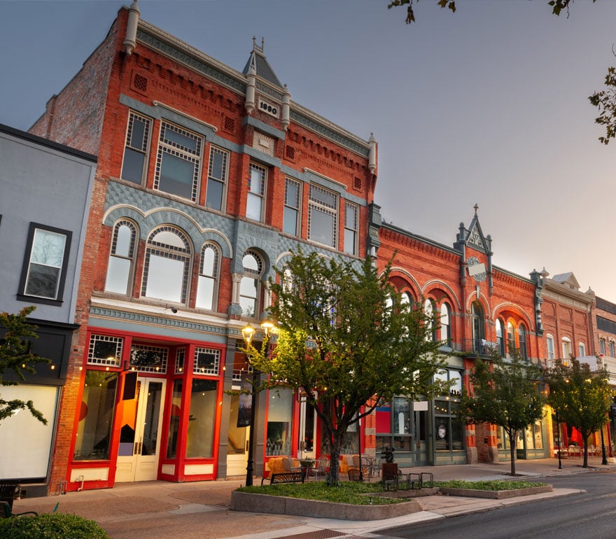 A street view of buildings and businesses