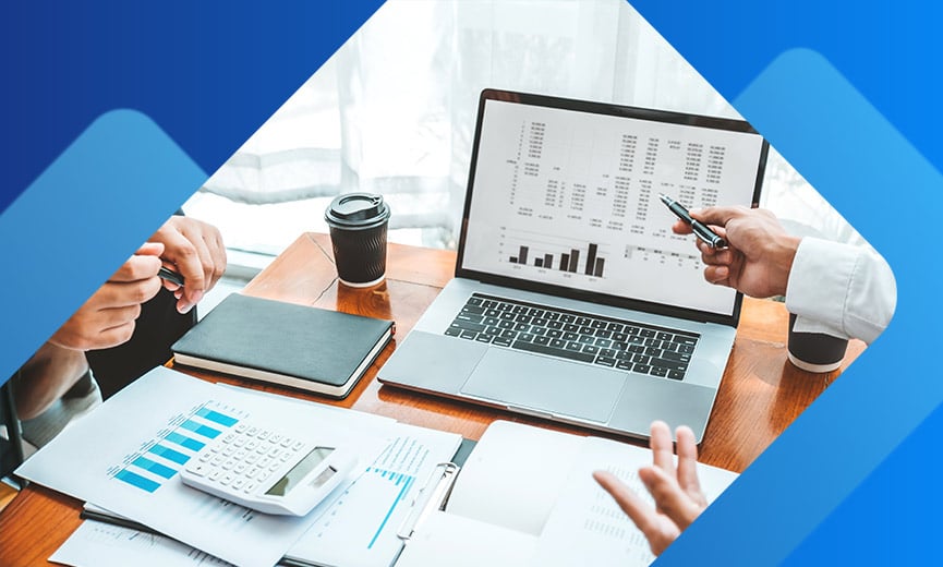 Two accountants discussing a client's info