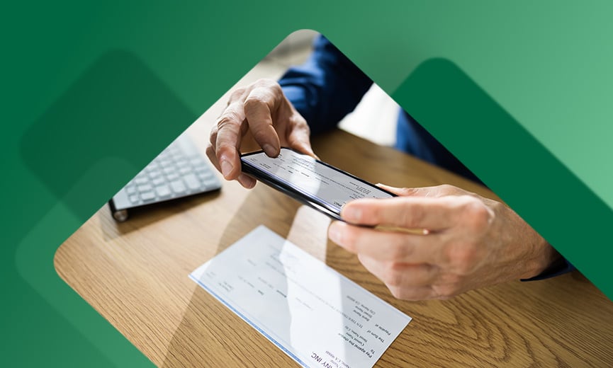 Person cashing a check digitally using their phone