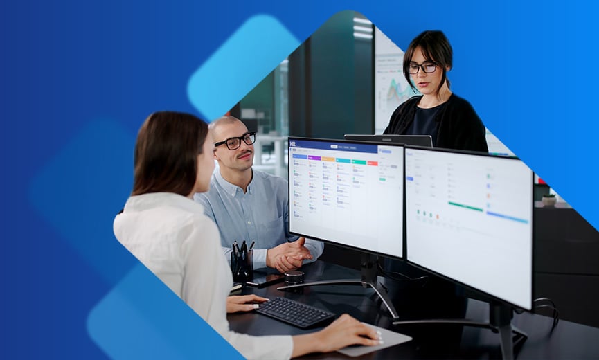 Start up business employees looking at upcoming schedule