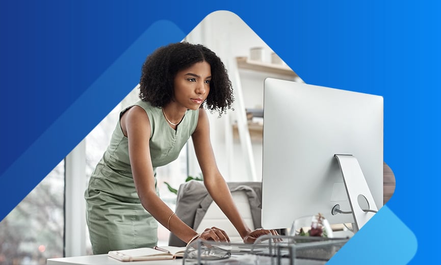 HR professional using her desktop computer