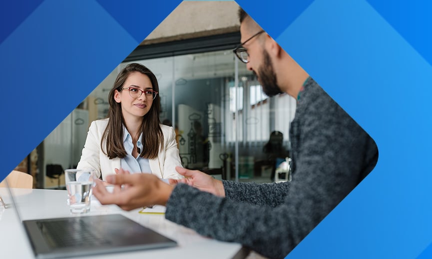 Coworkers discussing their current talent and planning