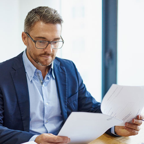 Business man looking at his finances