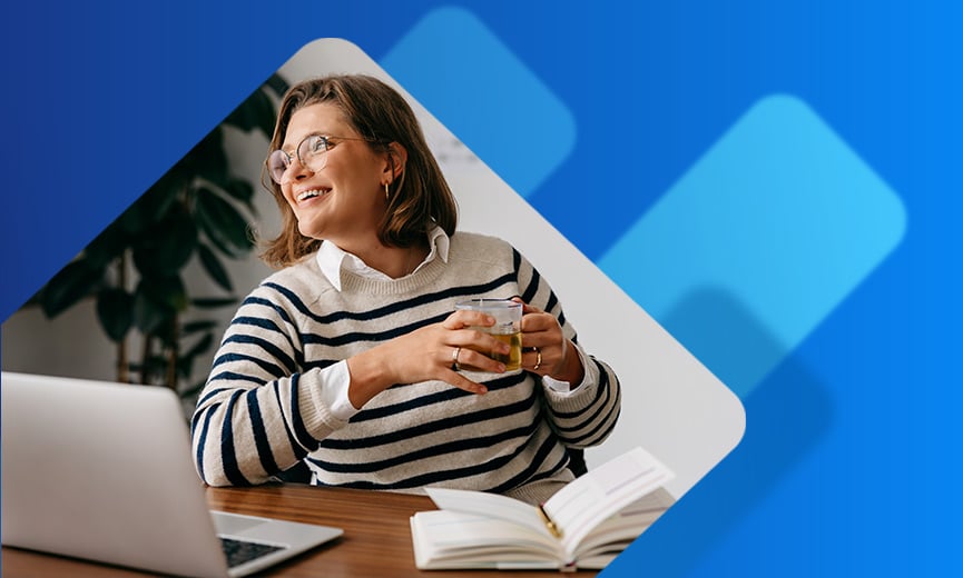 Happy HR professional enjoying a cup of tea