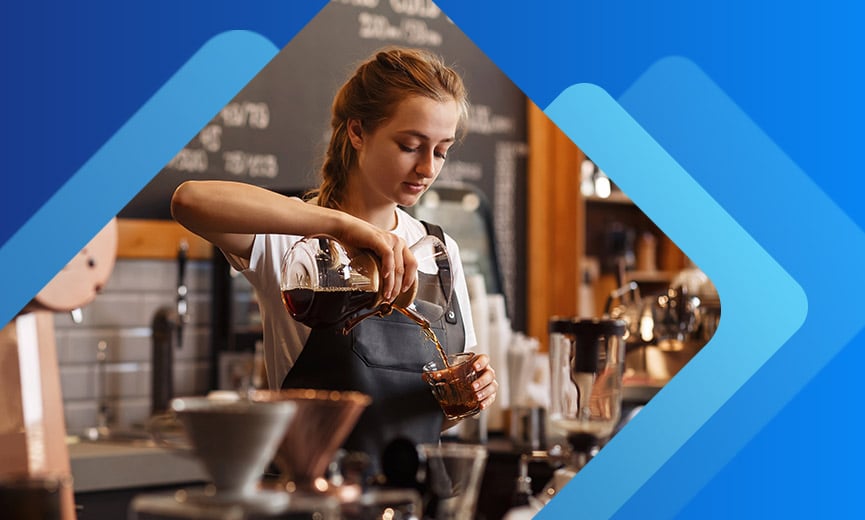Barista pouring coffee