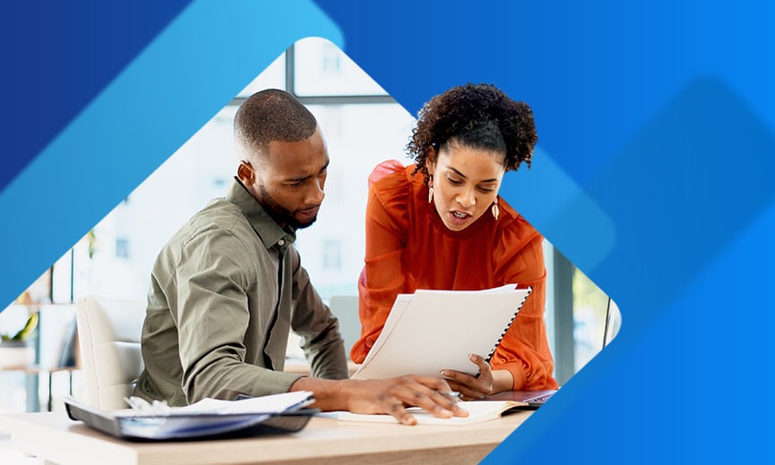Employees looking at open enrollment benefits