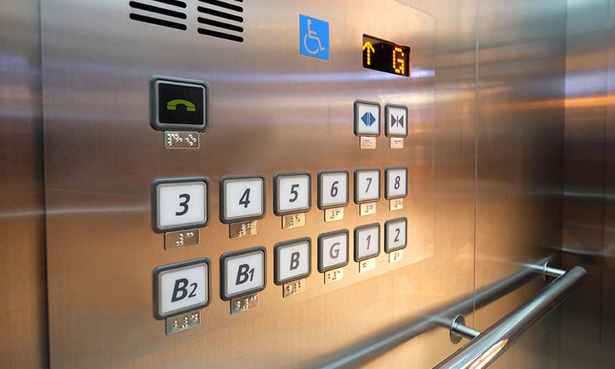 buttons in elevator with braille code