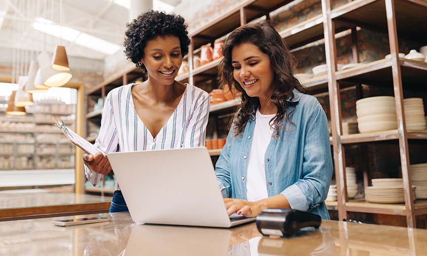 small business owners calculating quarterly taxes for their shop