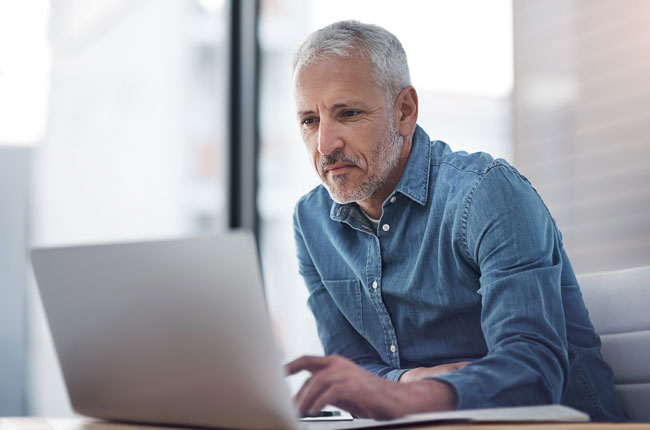 A business owner using the PPP loan forgiveness estimator