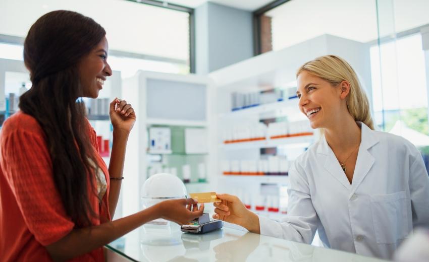 an employee using her hra and hsa benefit in a drug store
