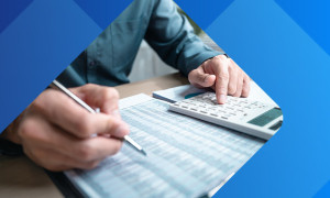 Business Owner working with ledger