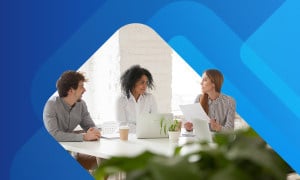 Group of professionals discussing employee benefits