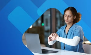 Medical employee looking at watch and calculating time and a half