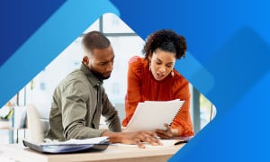 Employees looking at open enrollment benefits