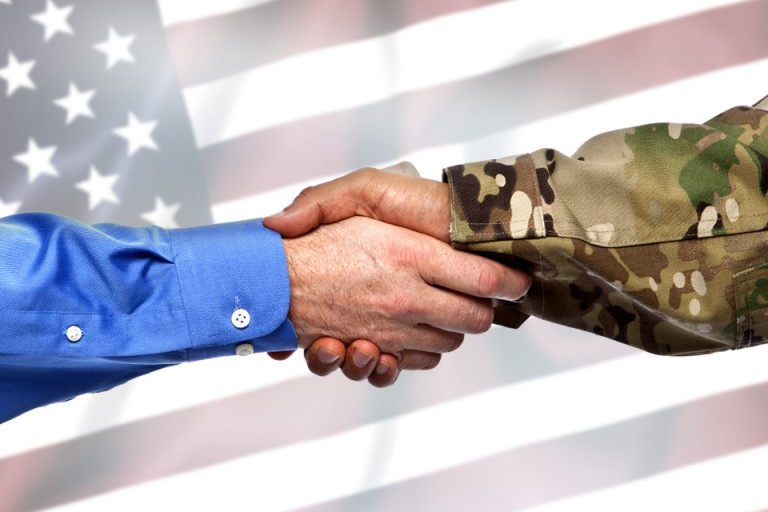 employee shaking a veterans hand
