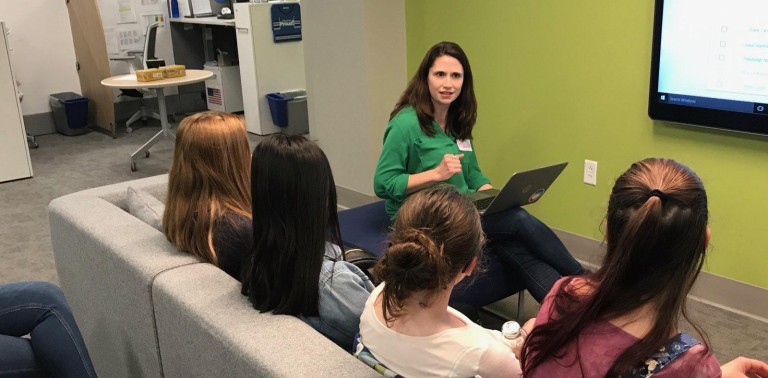 Maura Proctor, application test lead, is a member of Heather Fry's organization and presented in-person to a group of Girls Who Code members before the COVD-19 pandemic.