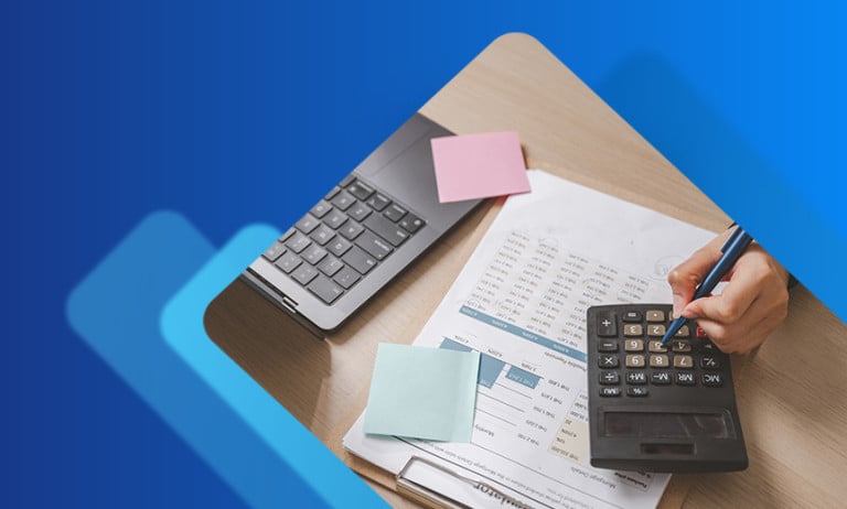 Business owner working with a payroll report