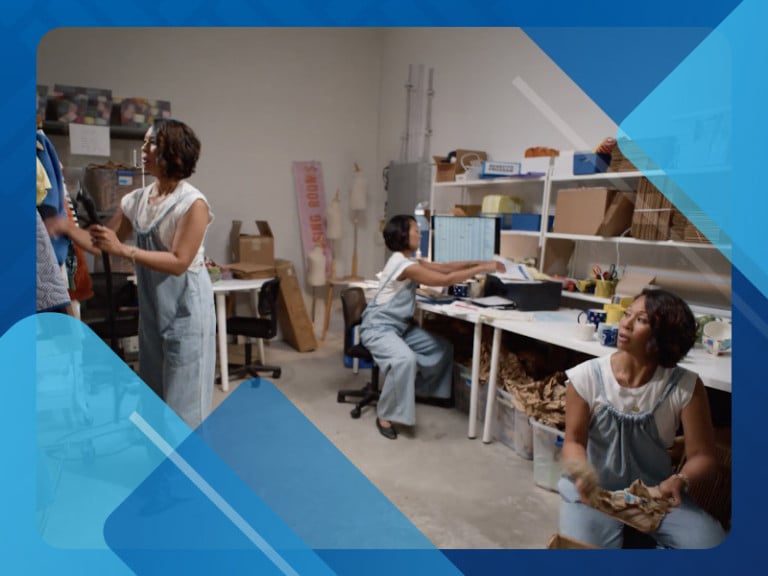 A business owner with clones of herself doing different tasks in the background