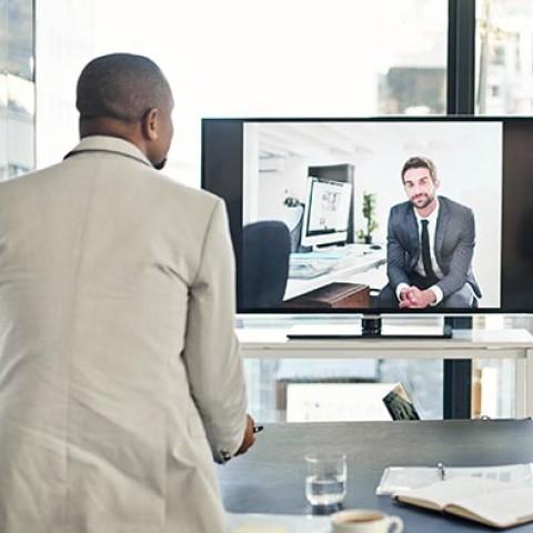 Two individuals discussing Maintaining Financial Wellness During Times of Business Disruption Primary tabs ••• View