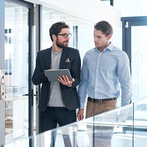 Two individuals working on onboarding