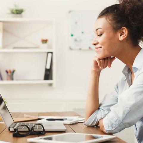women reviewing employee benefits