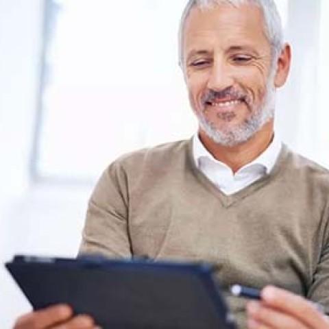 employer reviewing their payroll tax services