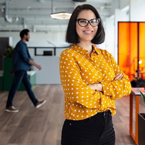 HR woman smiling in an office setting