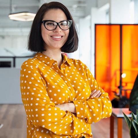 HR woman smiling in an office setting