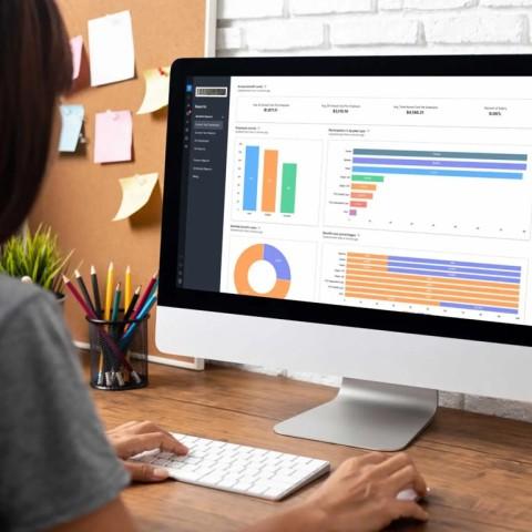 Employee navigating paychex secure benefits platform on their desktop