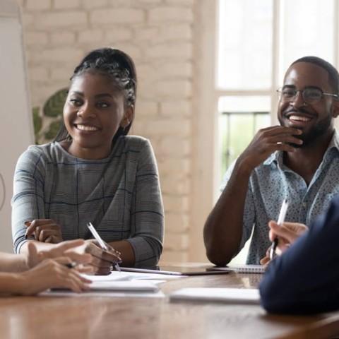 small business discussing benefits with employees